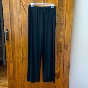 Black loose fitting pants with elastic waist. Size 16